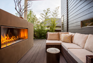 Outdoor fireplace with windows